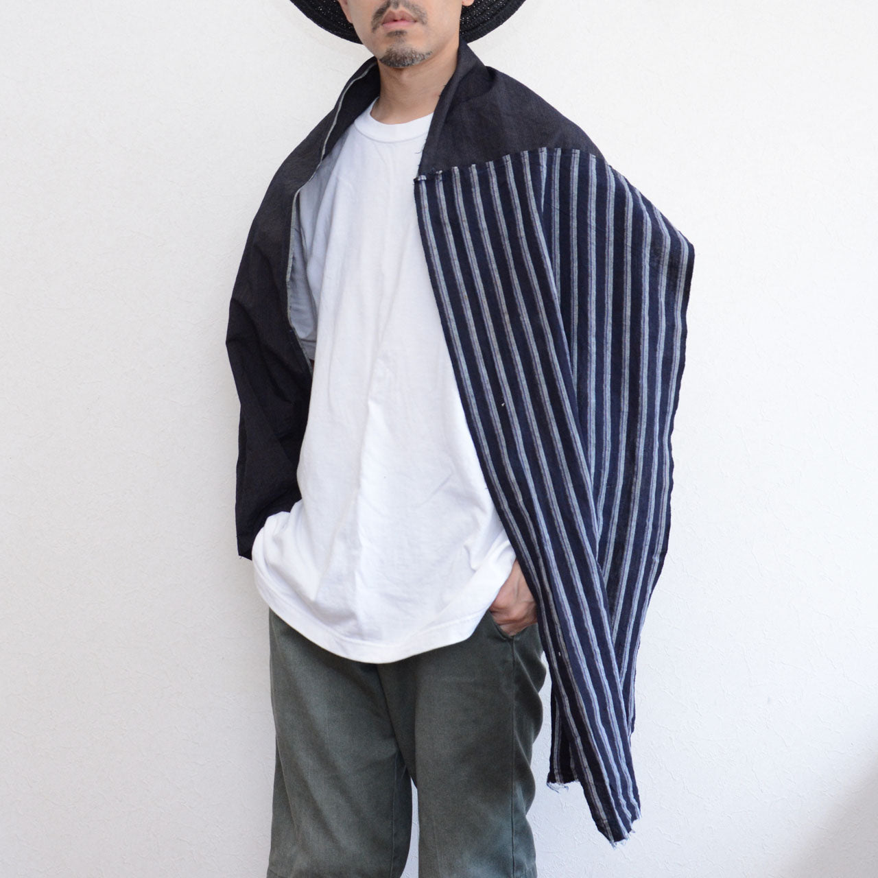 Hand-stitched striped cotton textile for wearable or decorative use