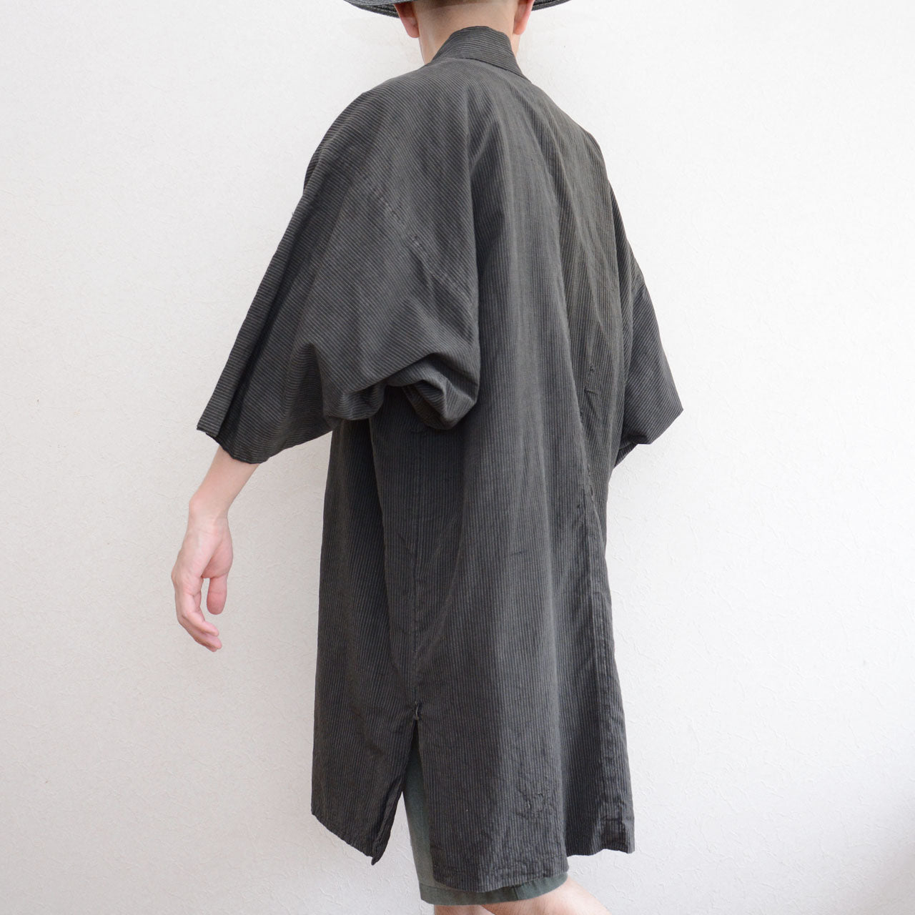 Hand-repaired vintage Japanese noragi with visible thread slippage