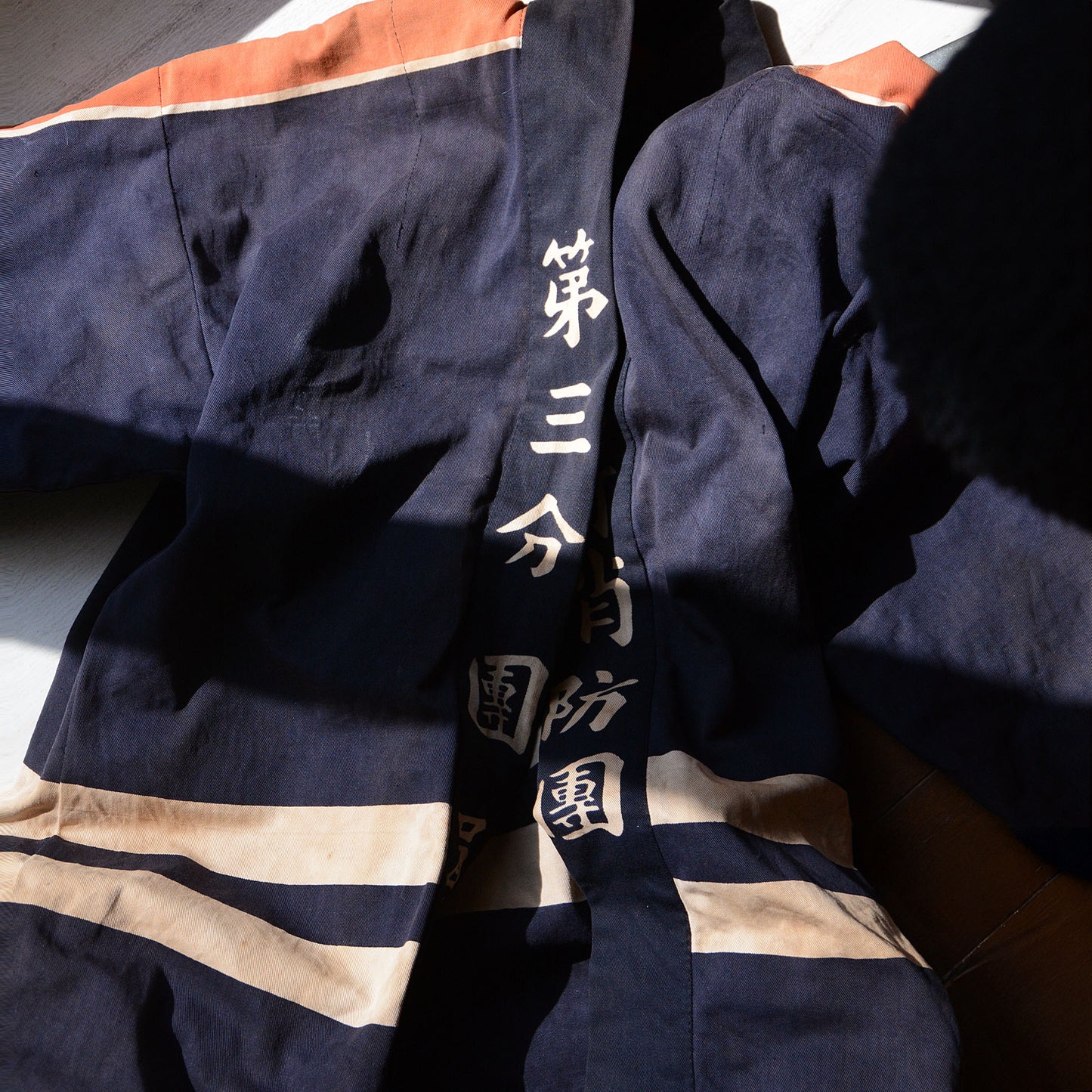 Classic Japanese fireman coat featuring kanji lettering