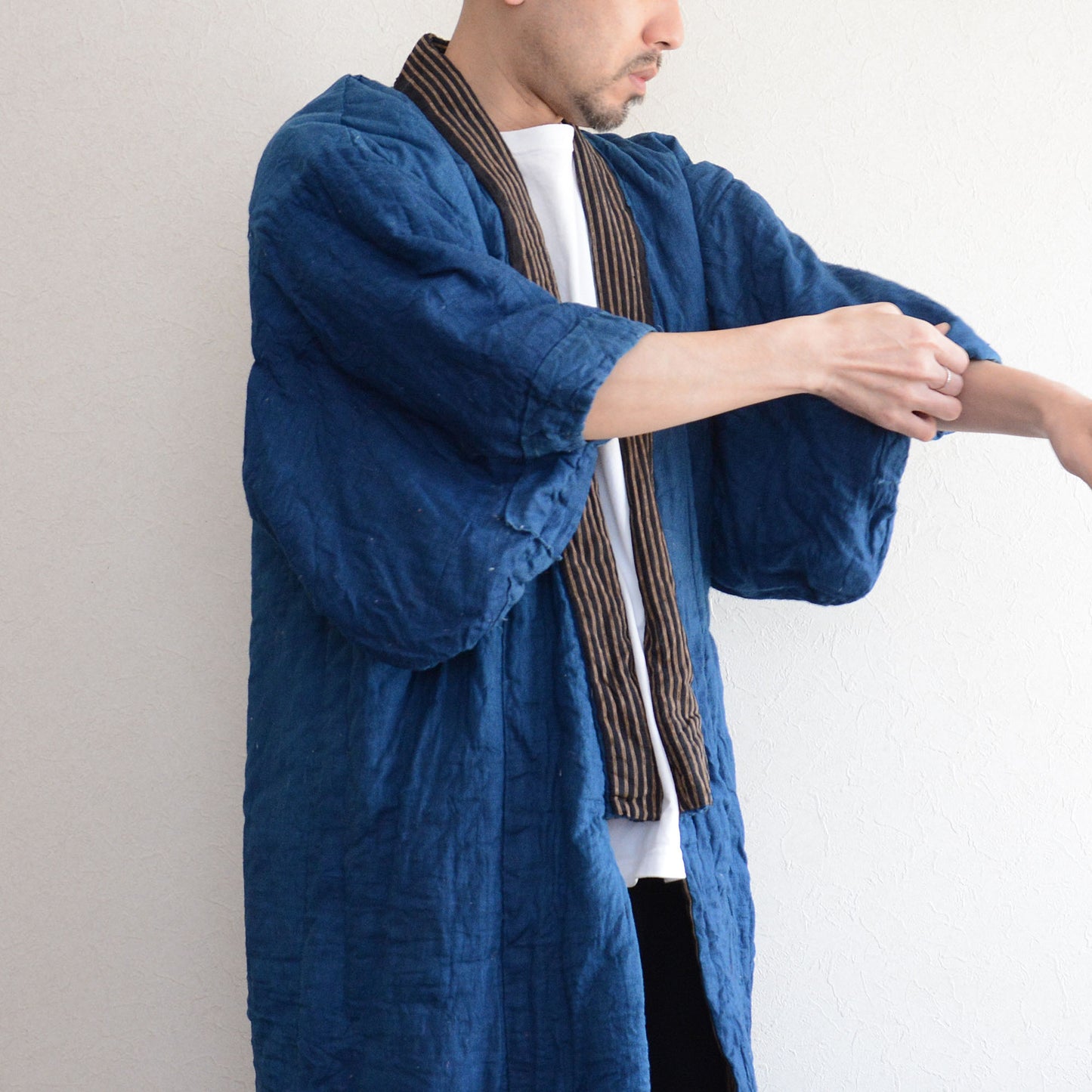 Authentic vintage Japanese hanten with bold indigo stripes and cotton padding