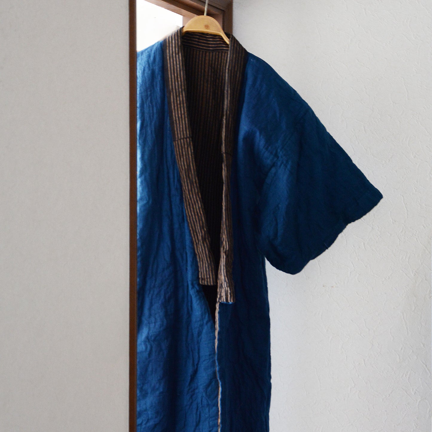 Heritage-inspired long padded hanten kimono robe made from vintage indigo cotton fabric