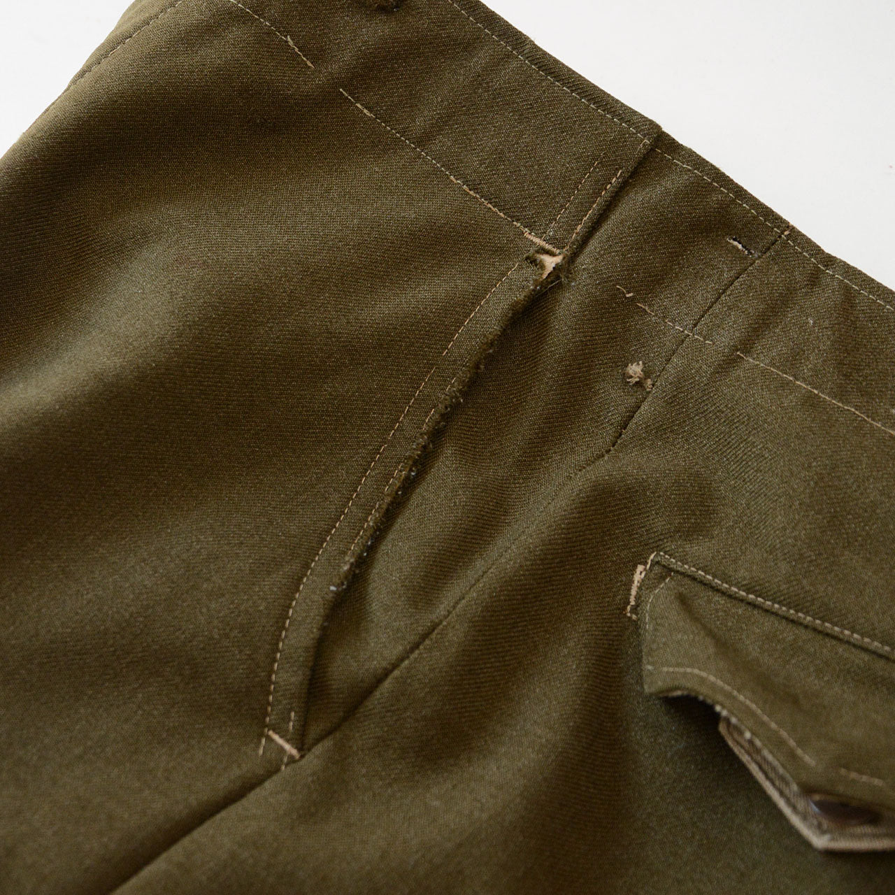 1950s wool military pants showing authentic wear