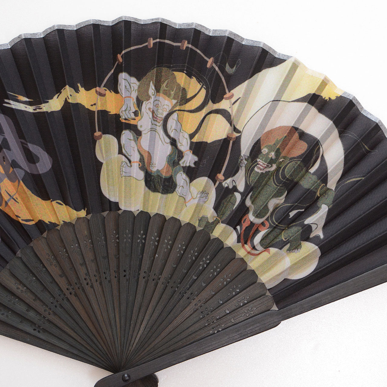 Japanese folding fan with Fujin Raijin design