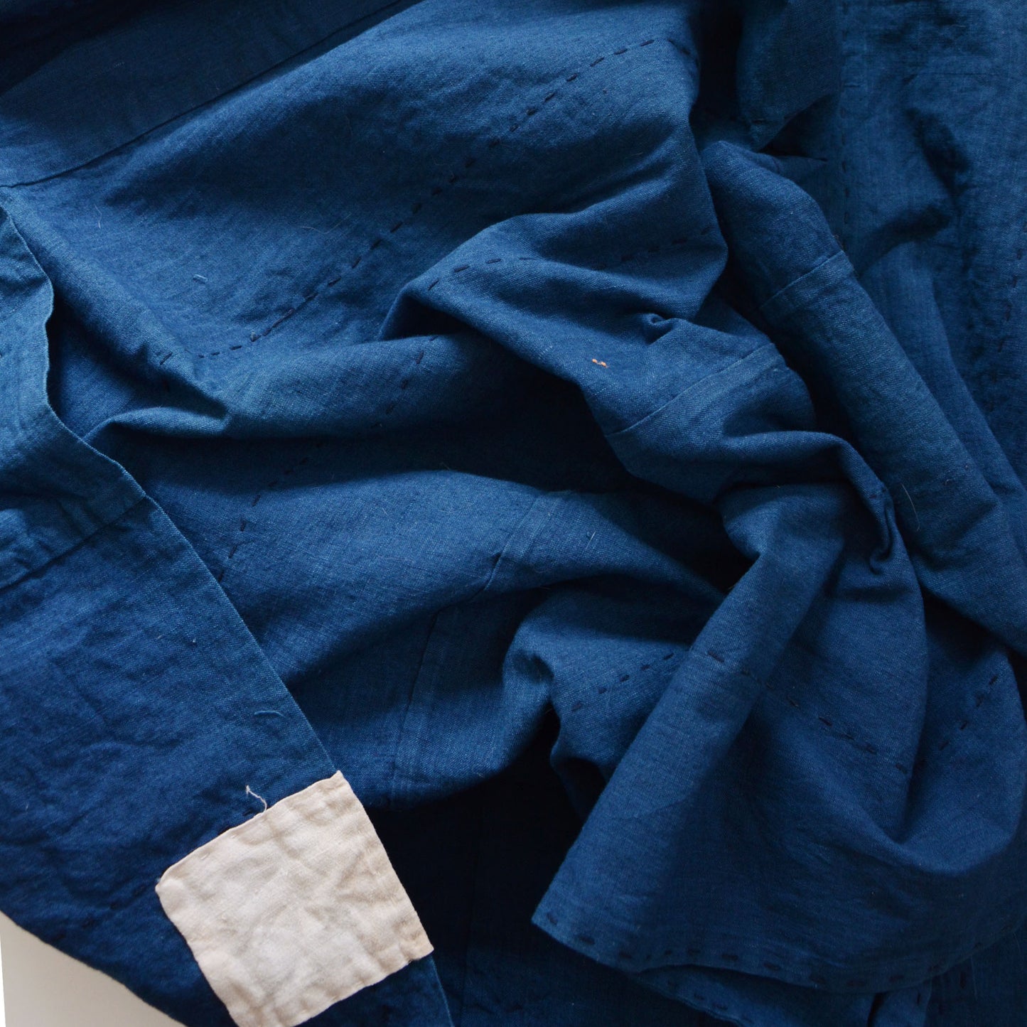 Vintage Japanese cotton fabric with natural indigo dye and sashiko stitching