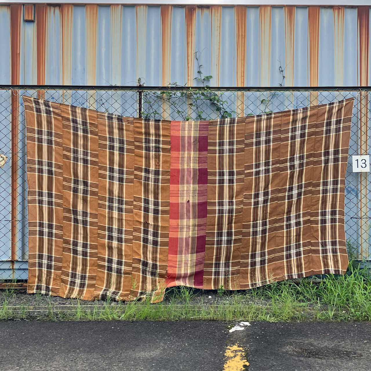 Japanese boro fabric with crazy patch design and visible hand stitching