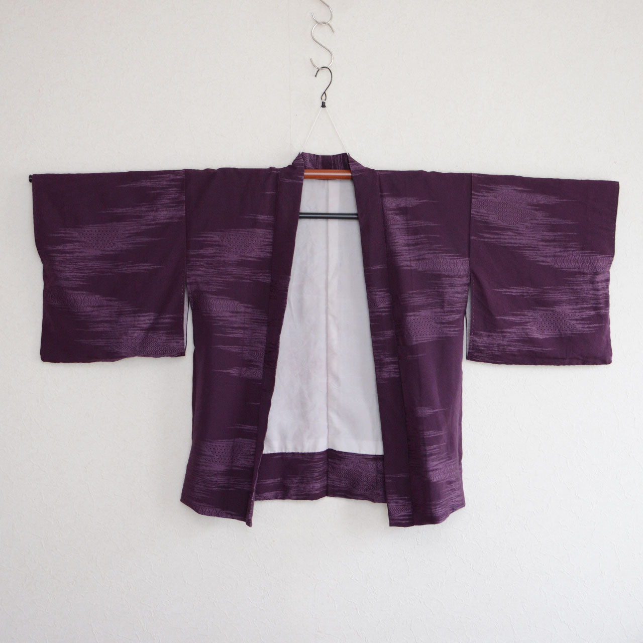 Traditional kimono-style haori with unique vintage fabric details
