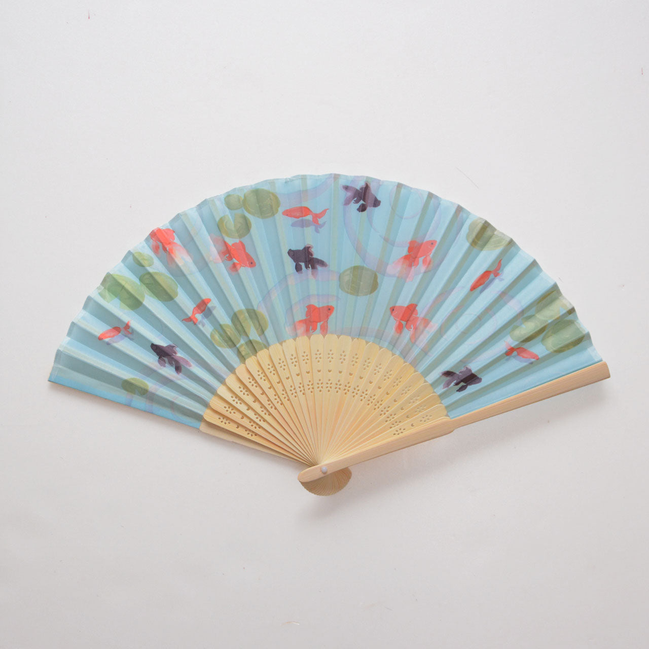 Traditional Japanese sensu fan featuring swimming goldfish pattern