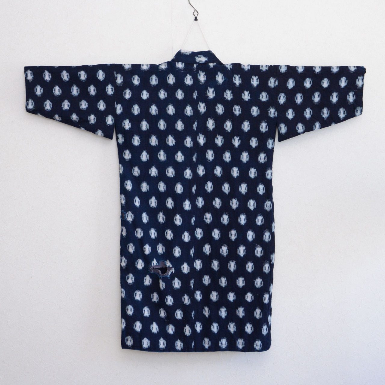 Japanese antique kimono with deep indigo dye and woven kasuri design