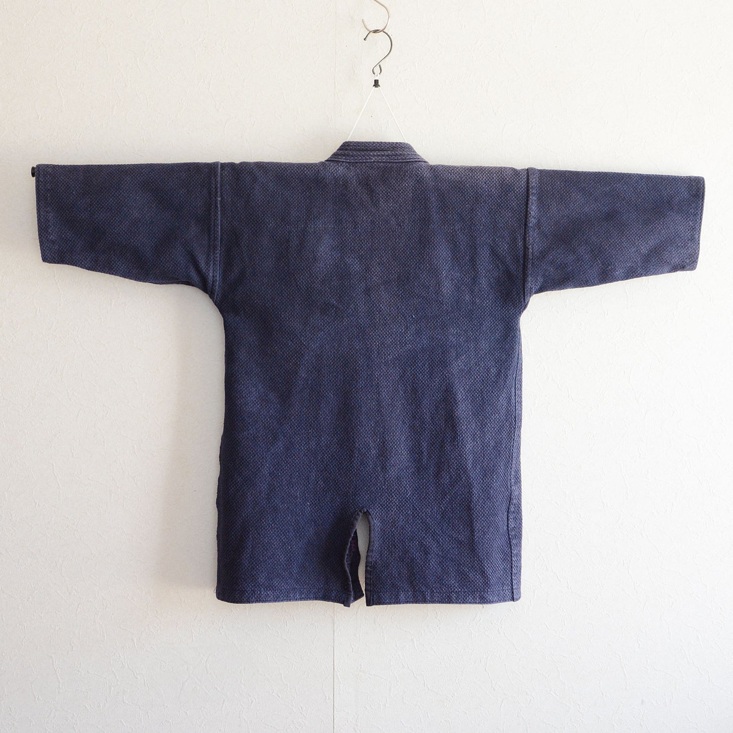 Kendo jacket with worn-in charm, crafted from cotton.