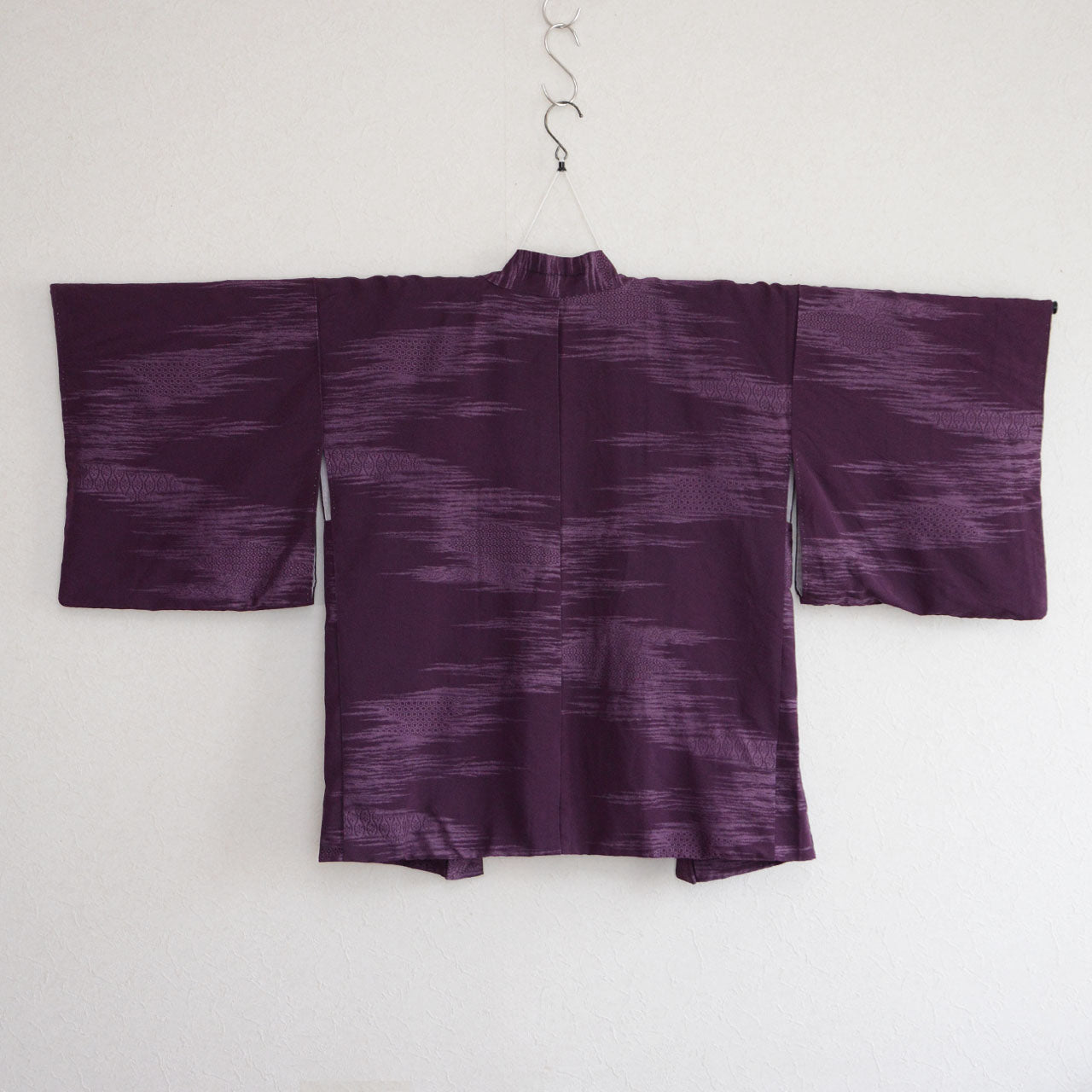 Japanese vintage haori highlighting its unique character and aged beauty
