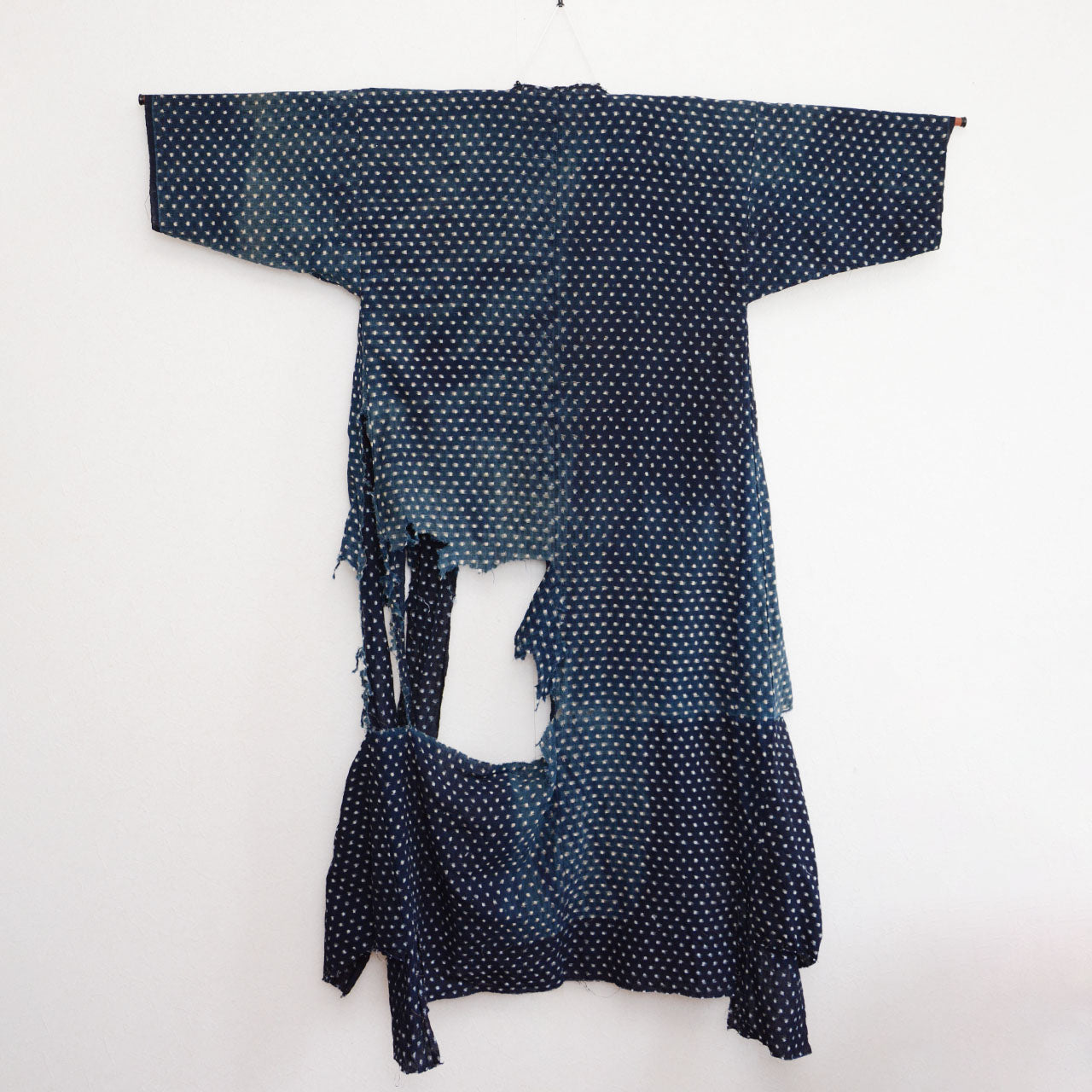 Antique Japanese textile with visible signs of age