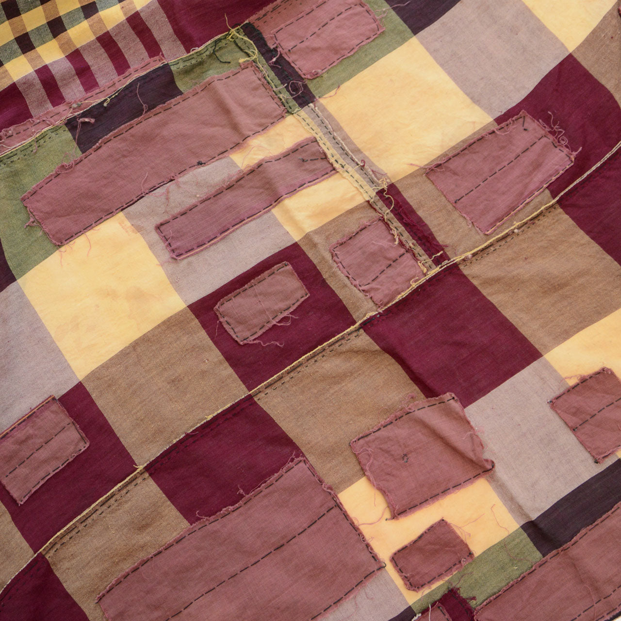 Authentic Japanese boro fabric with visible repairs and fading