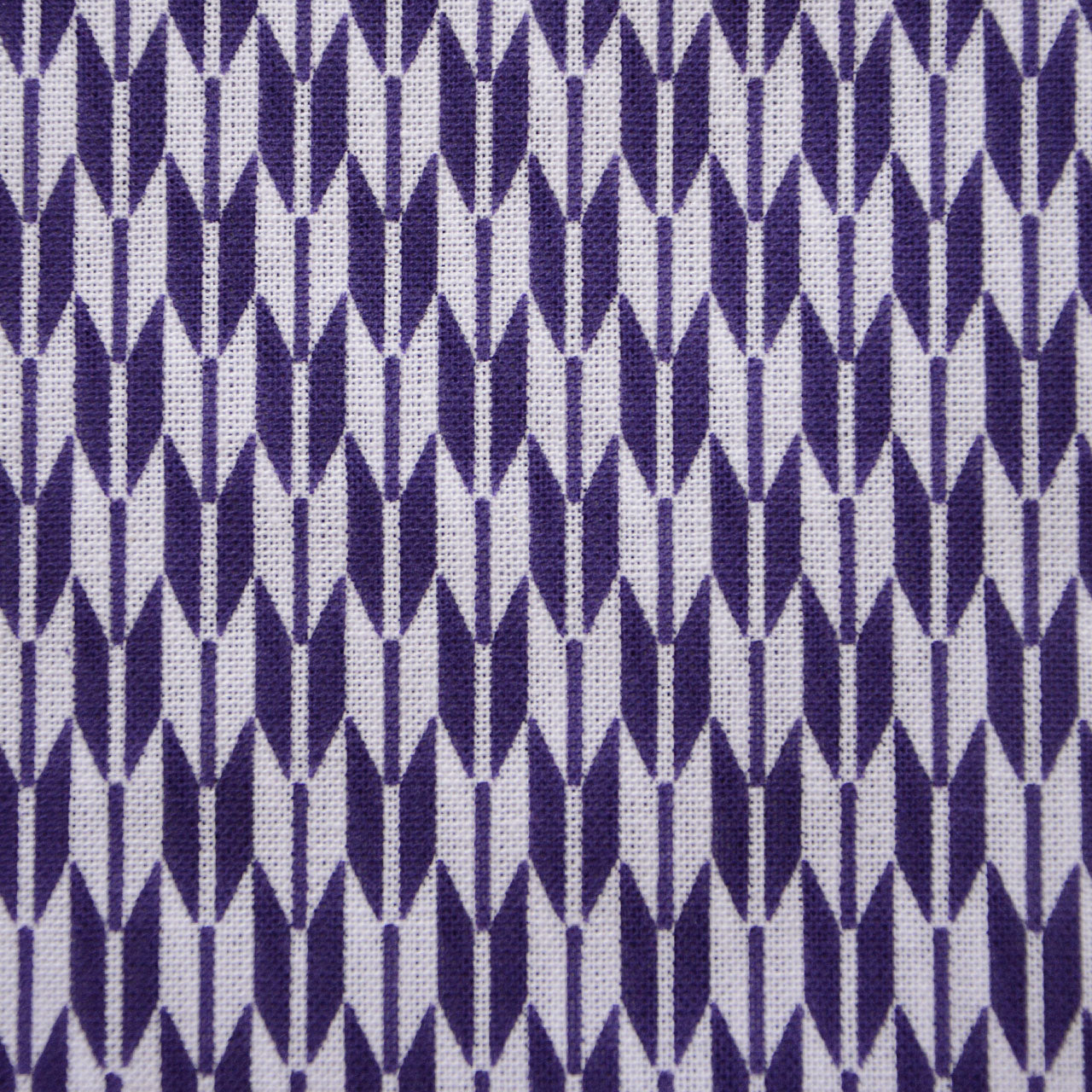 Traditional tenugui folded for use as a wristband