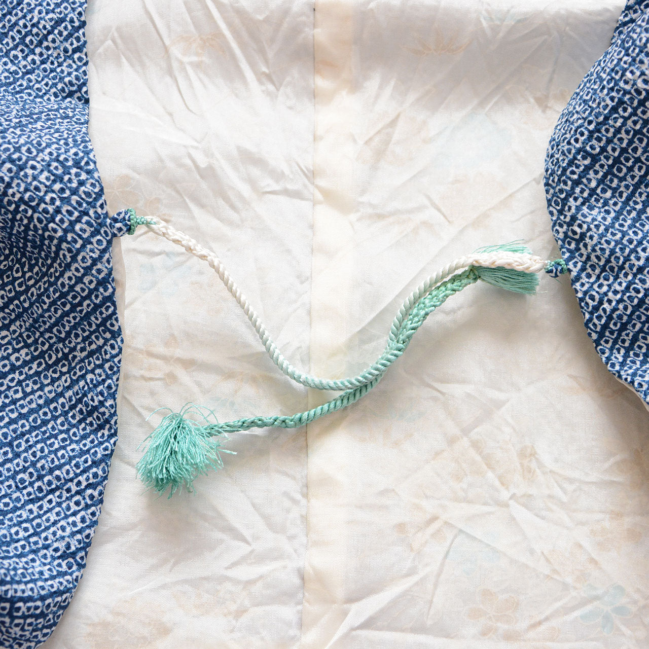 Vintage kimono cardigan with blue shibori-style fabric, ideal for modern styling