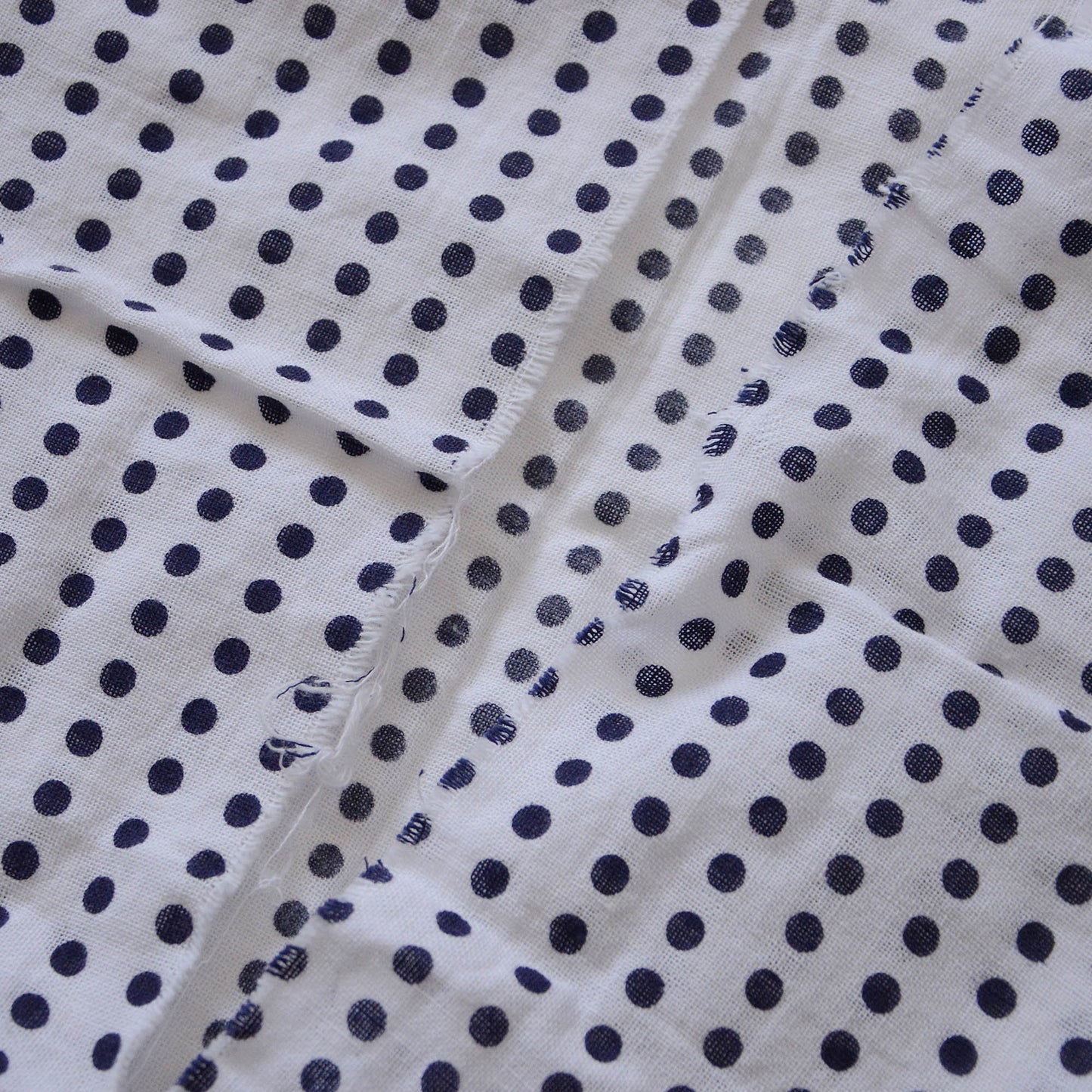 The frayed edges are a distinctive detail of tenugui