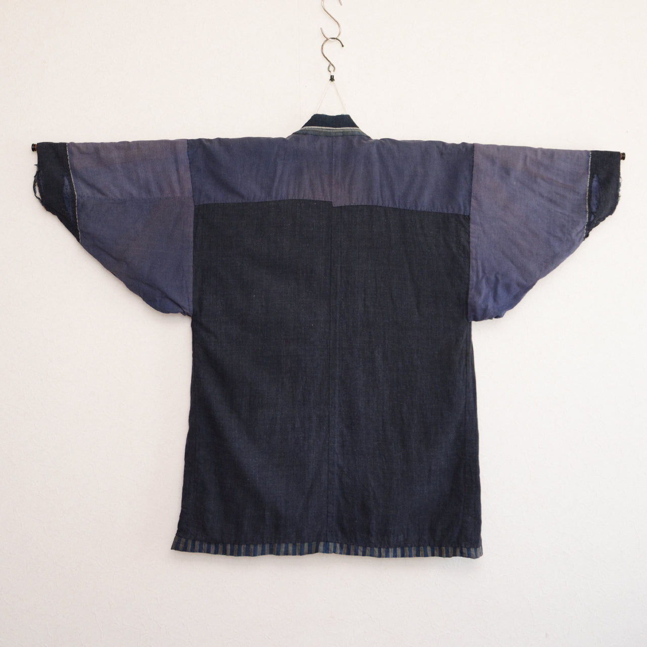 Traditional Japanese workwear jacket with rich indigo tone