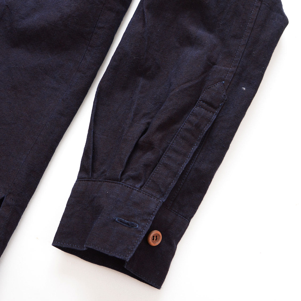 One-washed indigo band collar shirt for layering or standalone wear