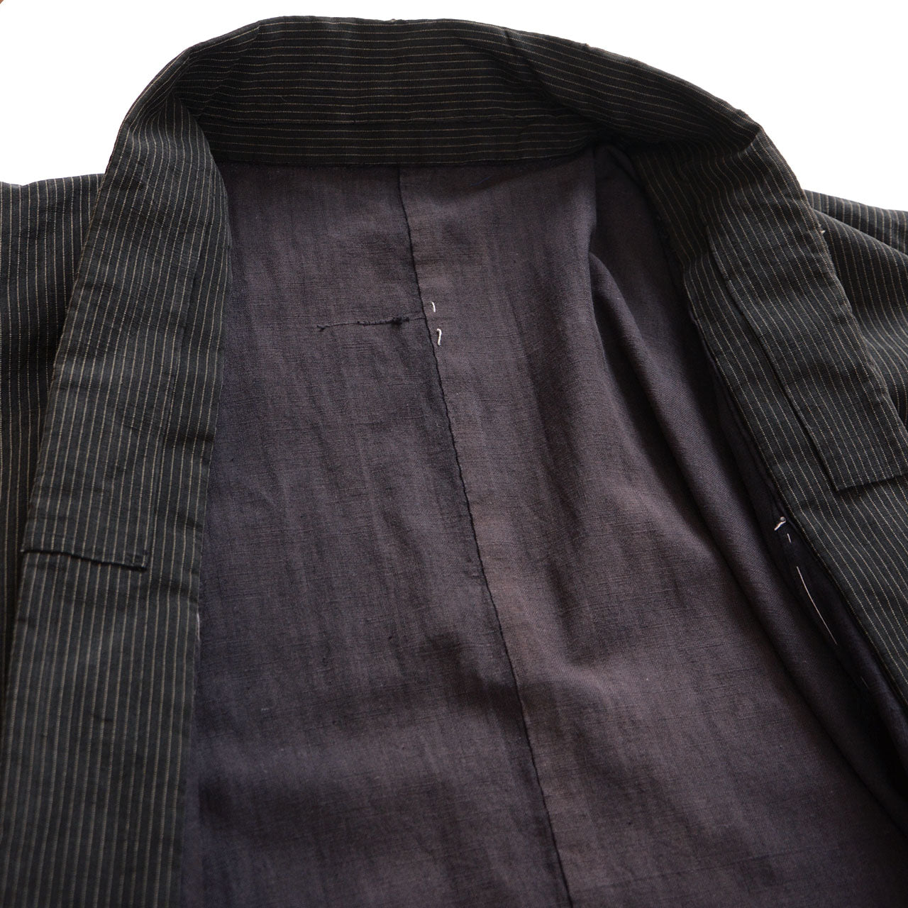 Faded Japanese folk workwear with bold texture and age marks