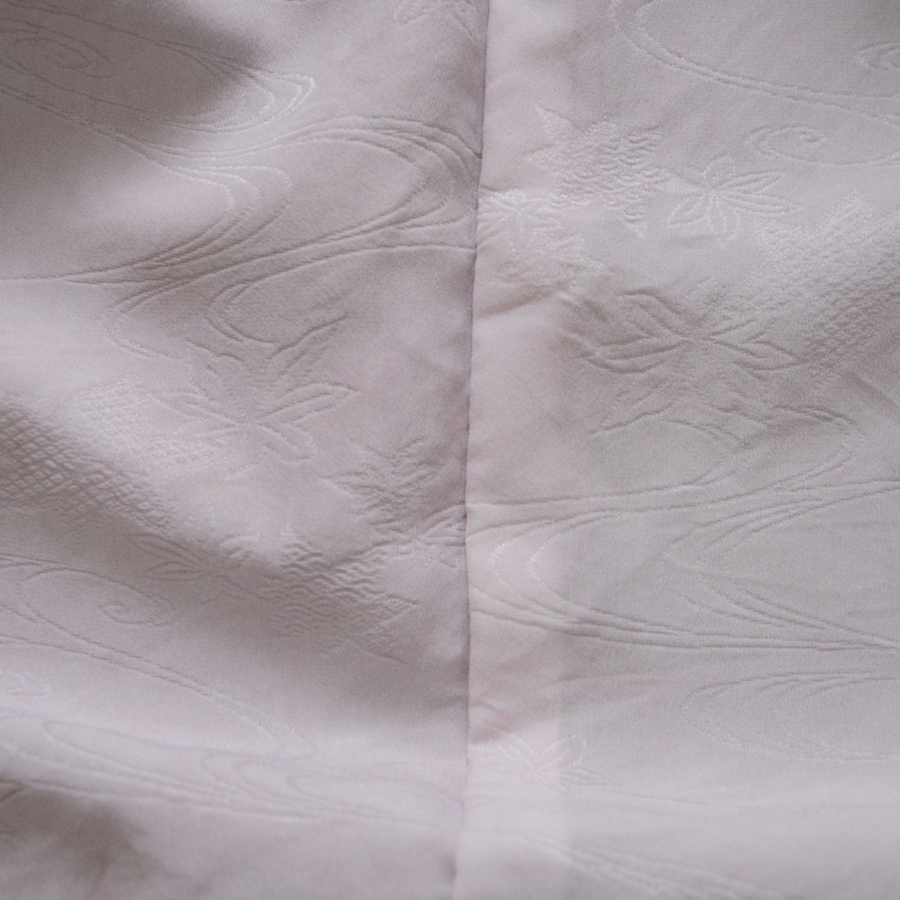 Japanese kimono jacket hung on a wall for interior styling inspiration
