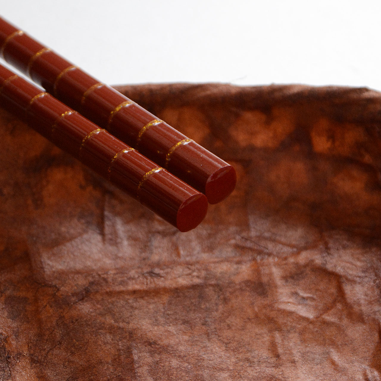 Durable bamboo chopsticks with subtle gold glitter