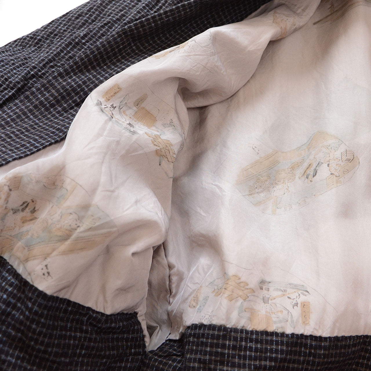 Japanese vintage outerwear with contrast between simple exterior and detailed lining