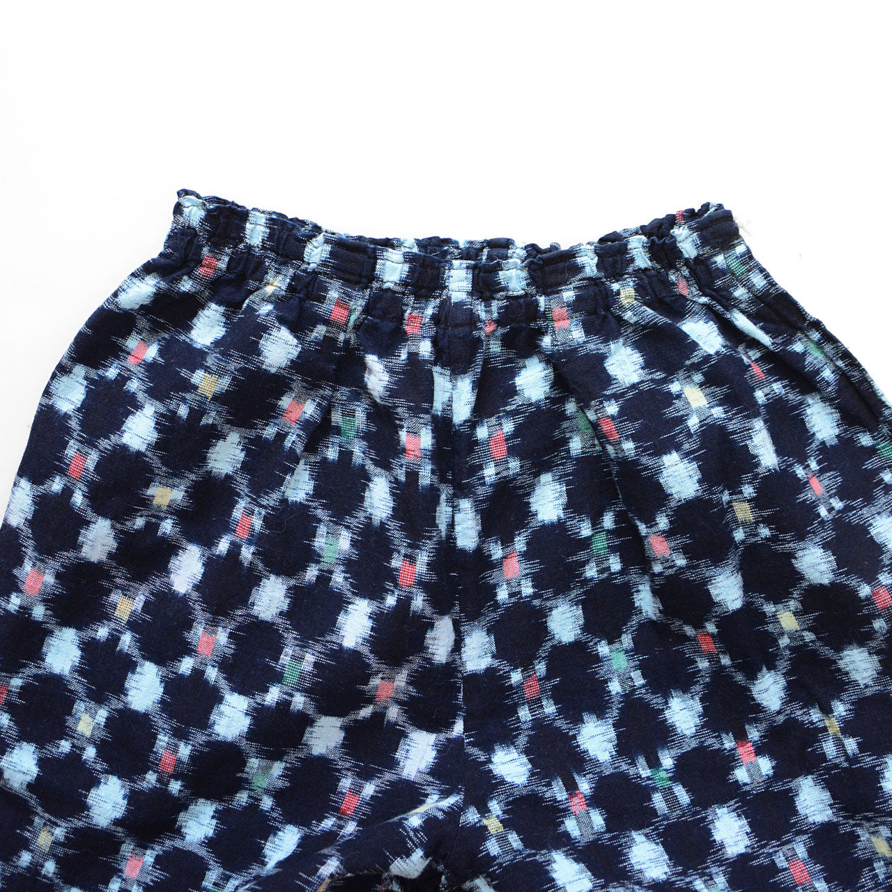 Handcrafted Japanese Monpe pants with classic kasuri pattern