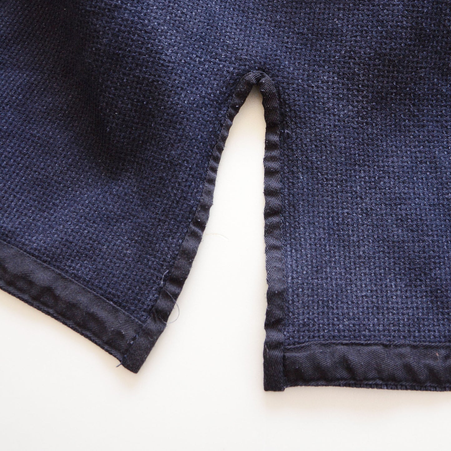 Martial arts jacket, cotton fabric gently faded.