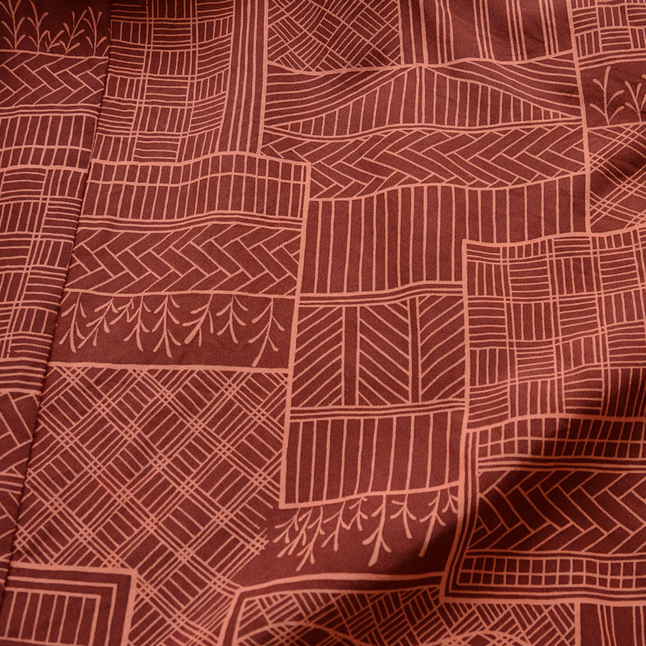 Artful Japanese vintage garment with textured fabric and earthy tones