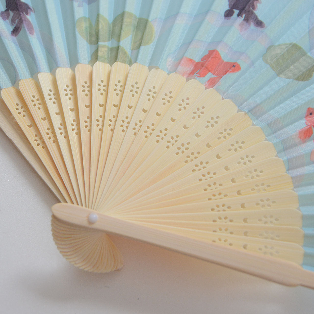 Japanese fan symbolizing tranquility and seasonal beauty