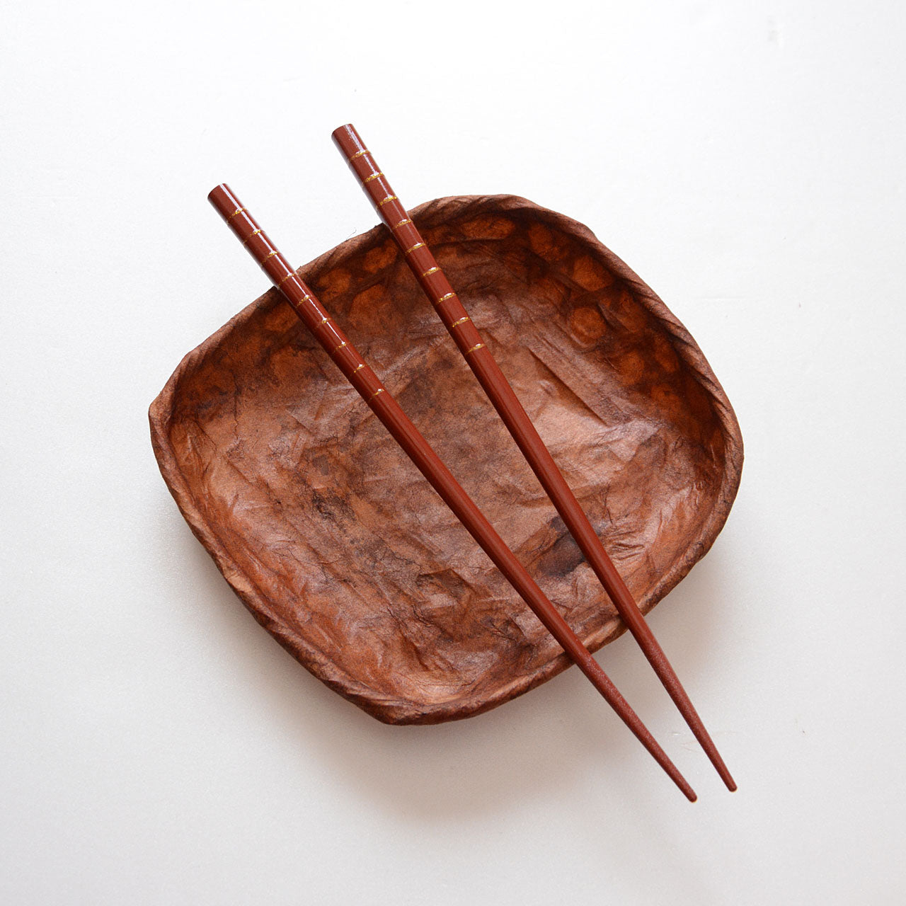 Japanese dining chopsticks made from bamboo with gold accents