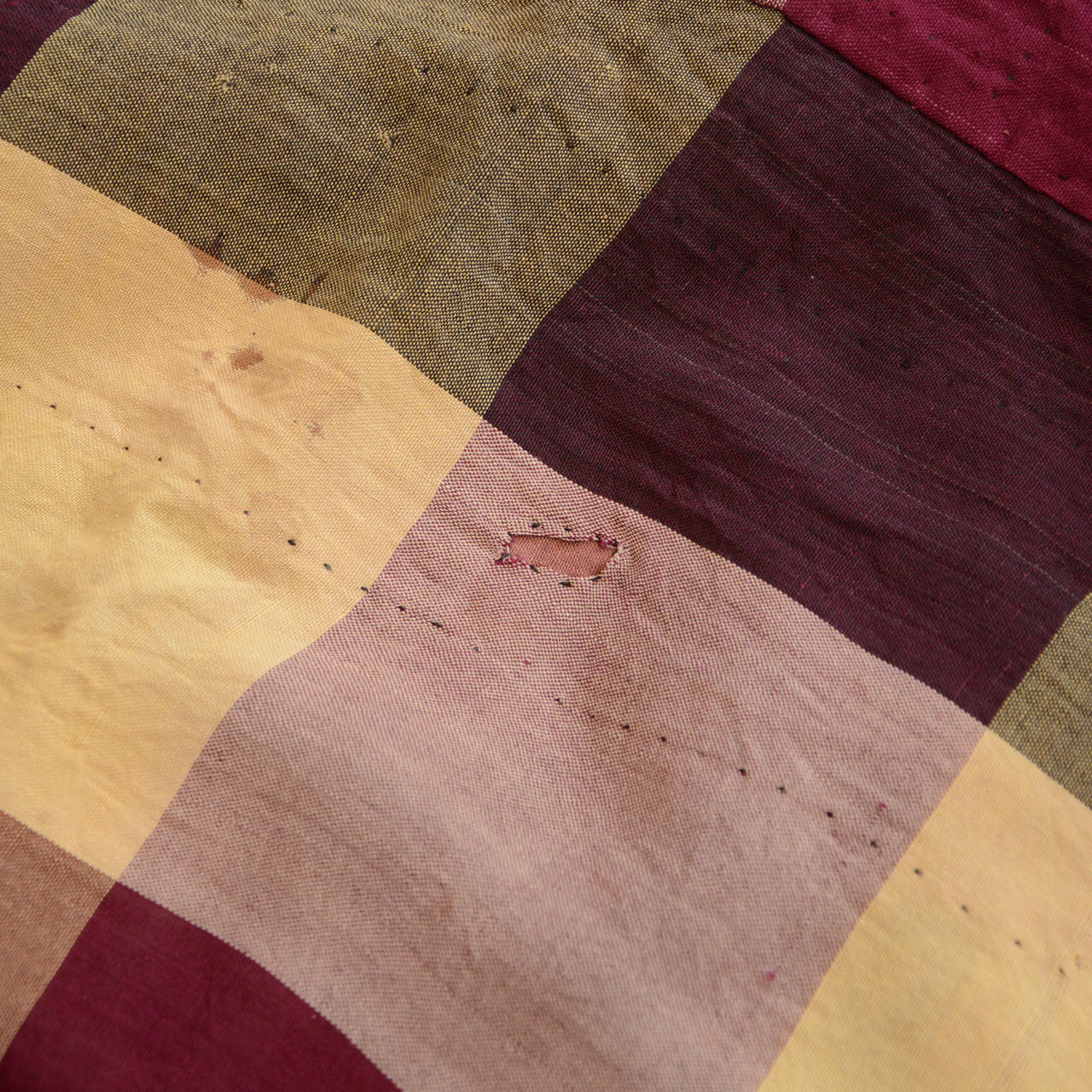 Textured Japanese cotton with layered patching and sashiko stitching