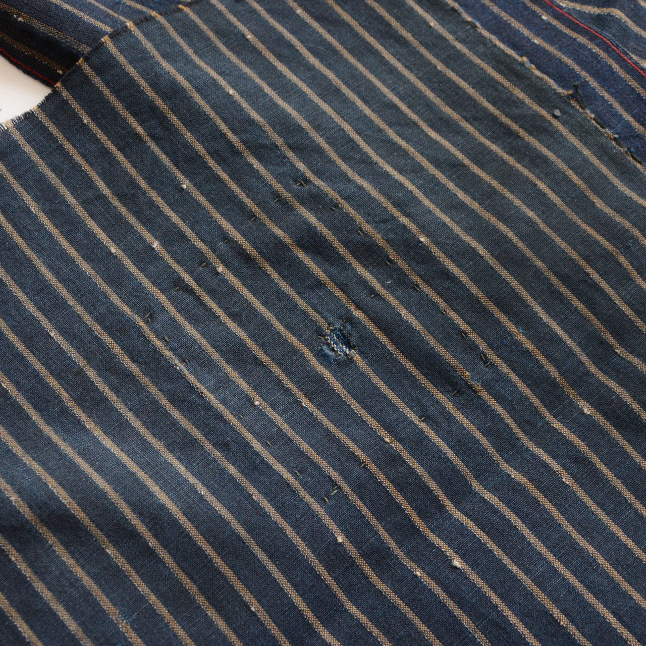 Antique Japanese striped cotton with natural fading and wear