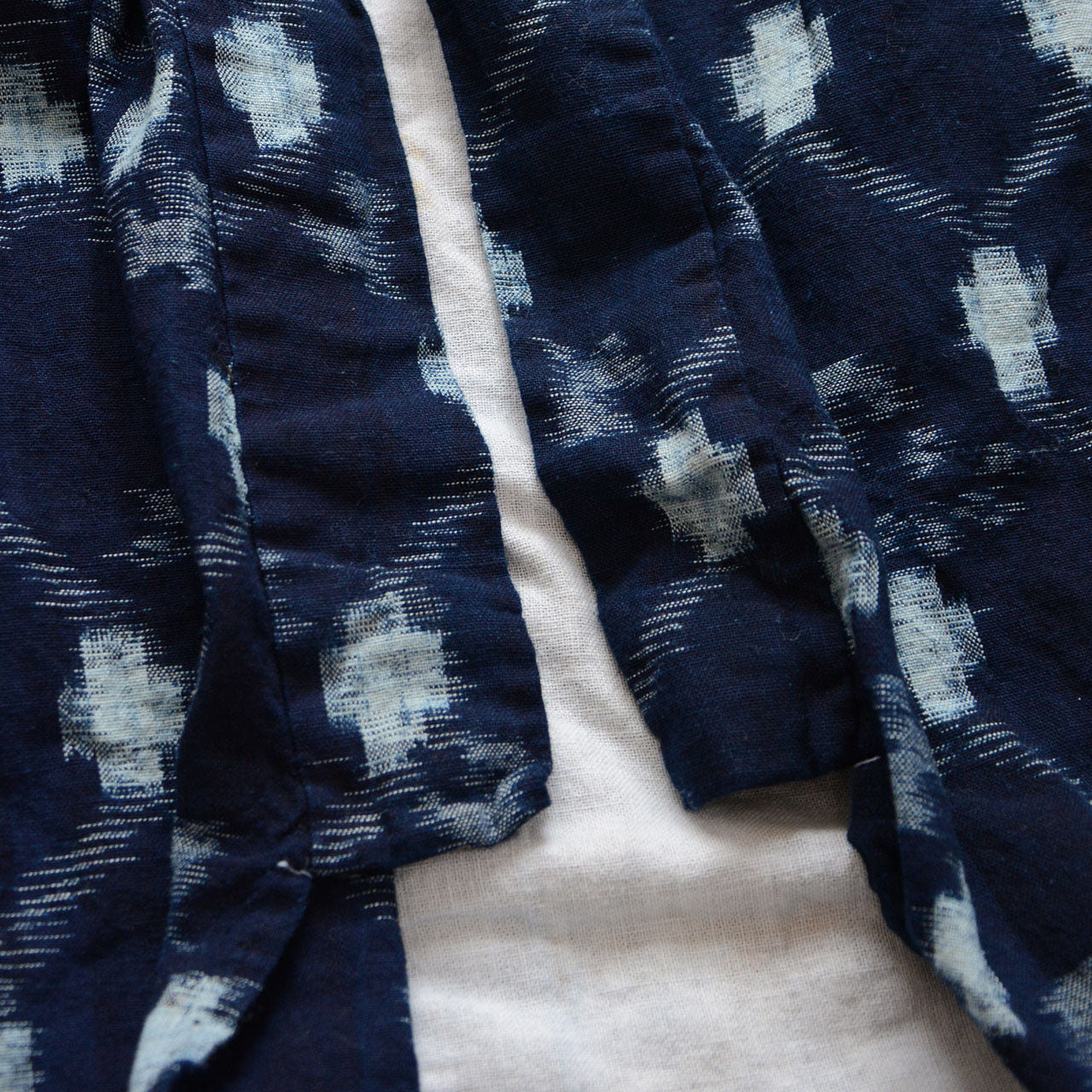 Rustic indigo noragi jacket with traditional kasuri patterns