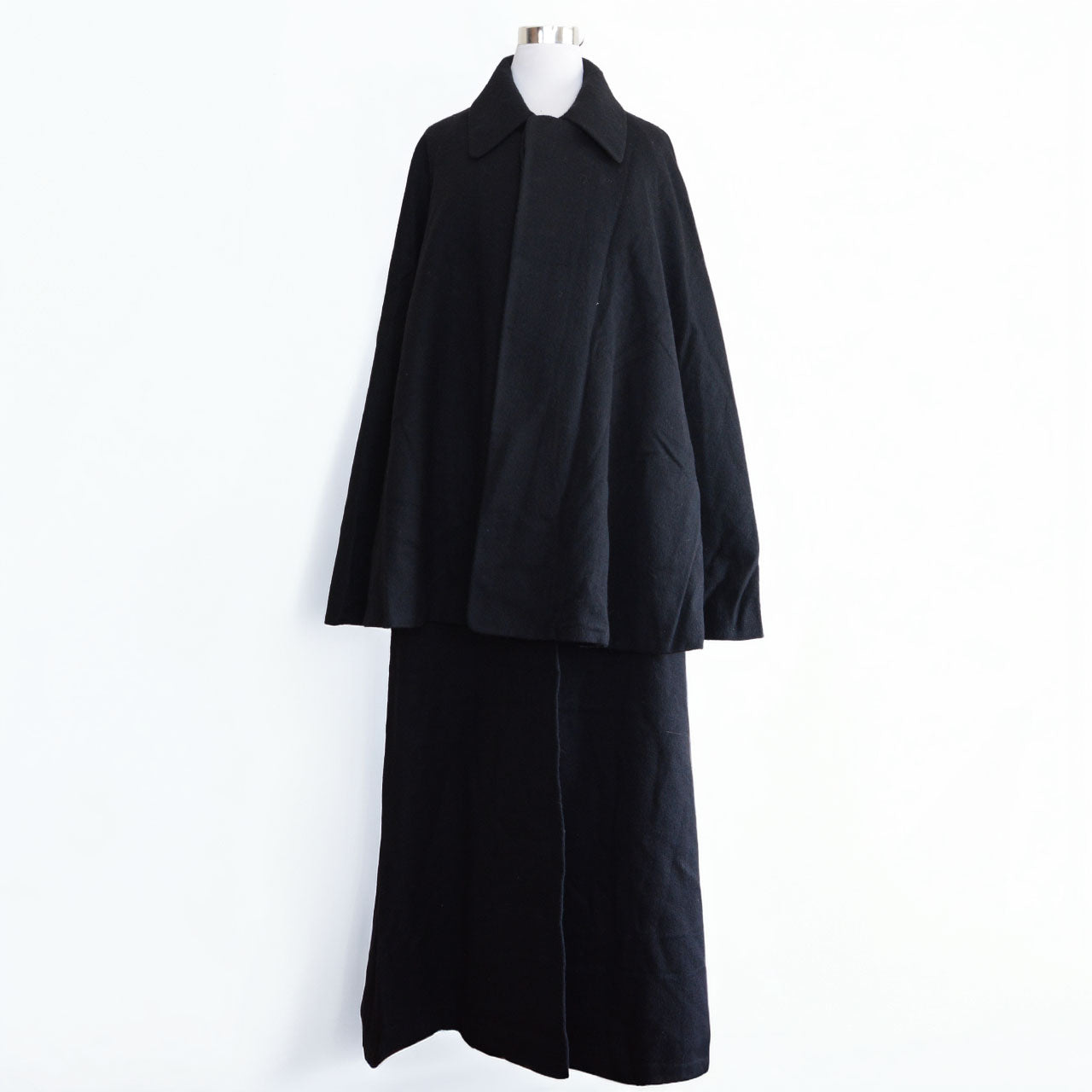 Japanese vintage Tonbi mantle highlighting understated black wool texture and elegant form