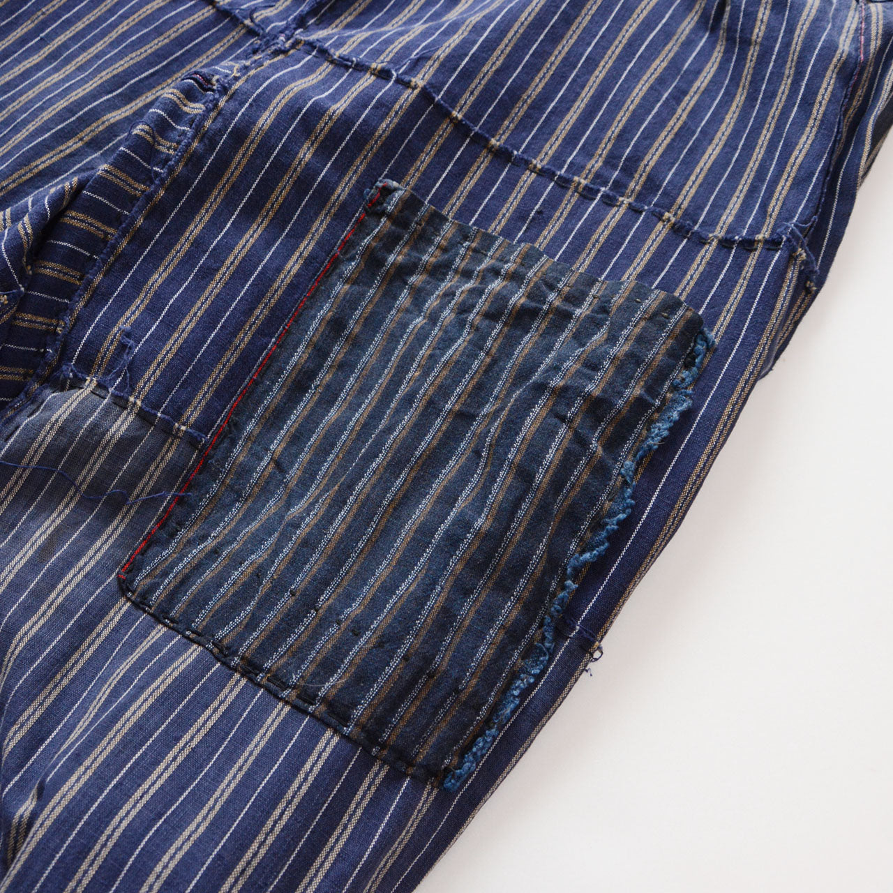 Interior pocket detail of stripe cotton monpe pants, hand-stitched cotton pocket, blue stripe cotton lining, Tohoku Japan vintage
