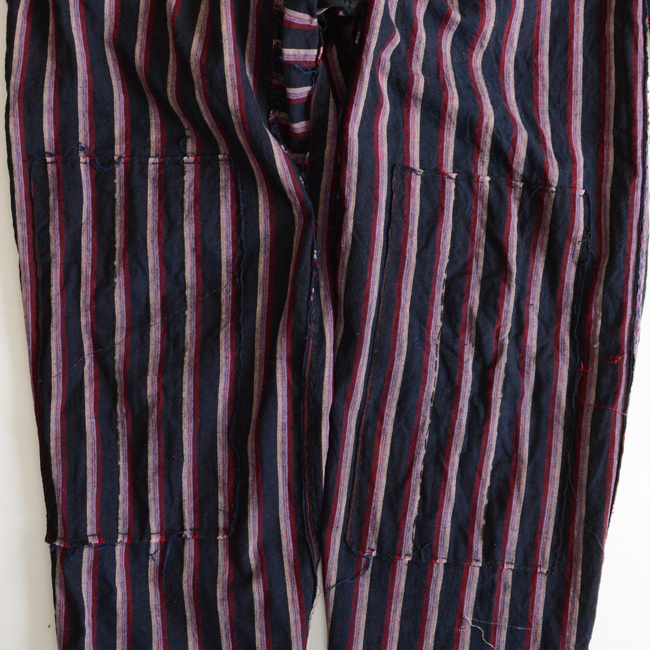 Traditional Japanese cotton pants reflecting the aesthetic of historical workwear culture.