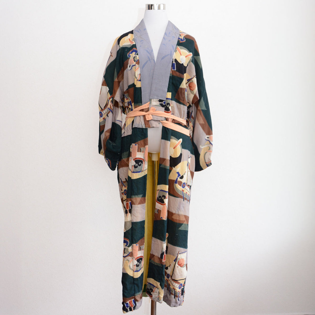 Japanese vintage nagajuban kimono with grey collar, peach waist ties, animal and boat motifs and yellow lining