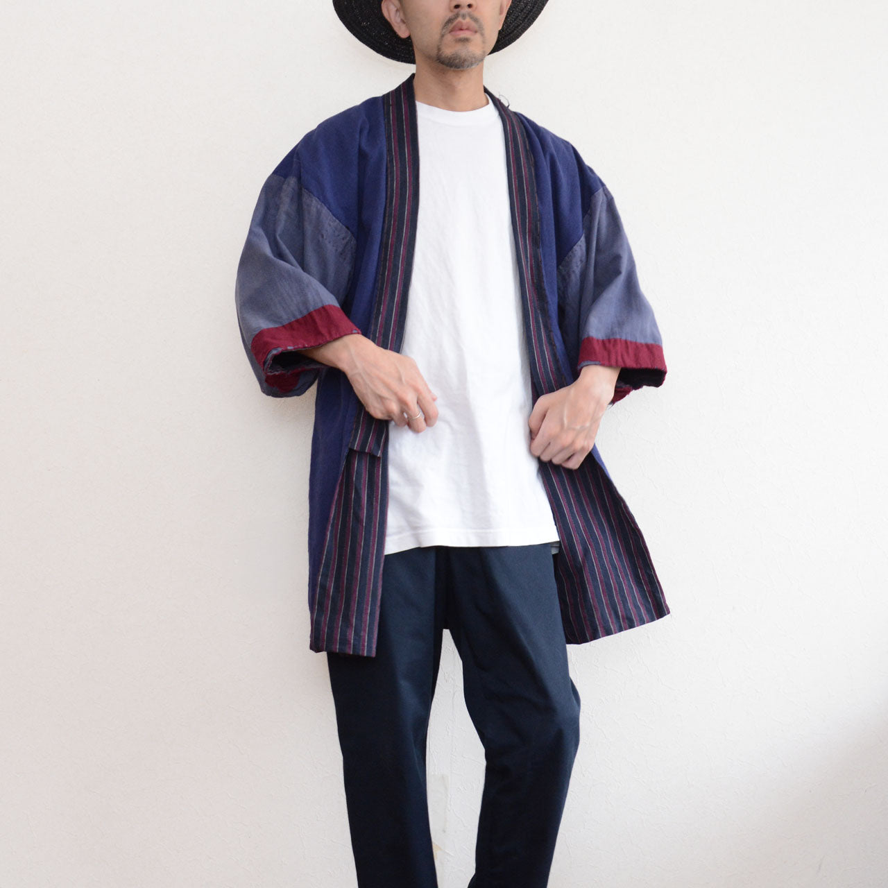 Front view of a model wearing a vintage Japanese noragi with a relaxed silhouette and contrasting sleeves