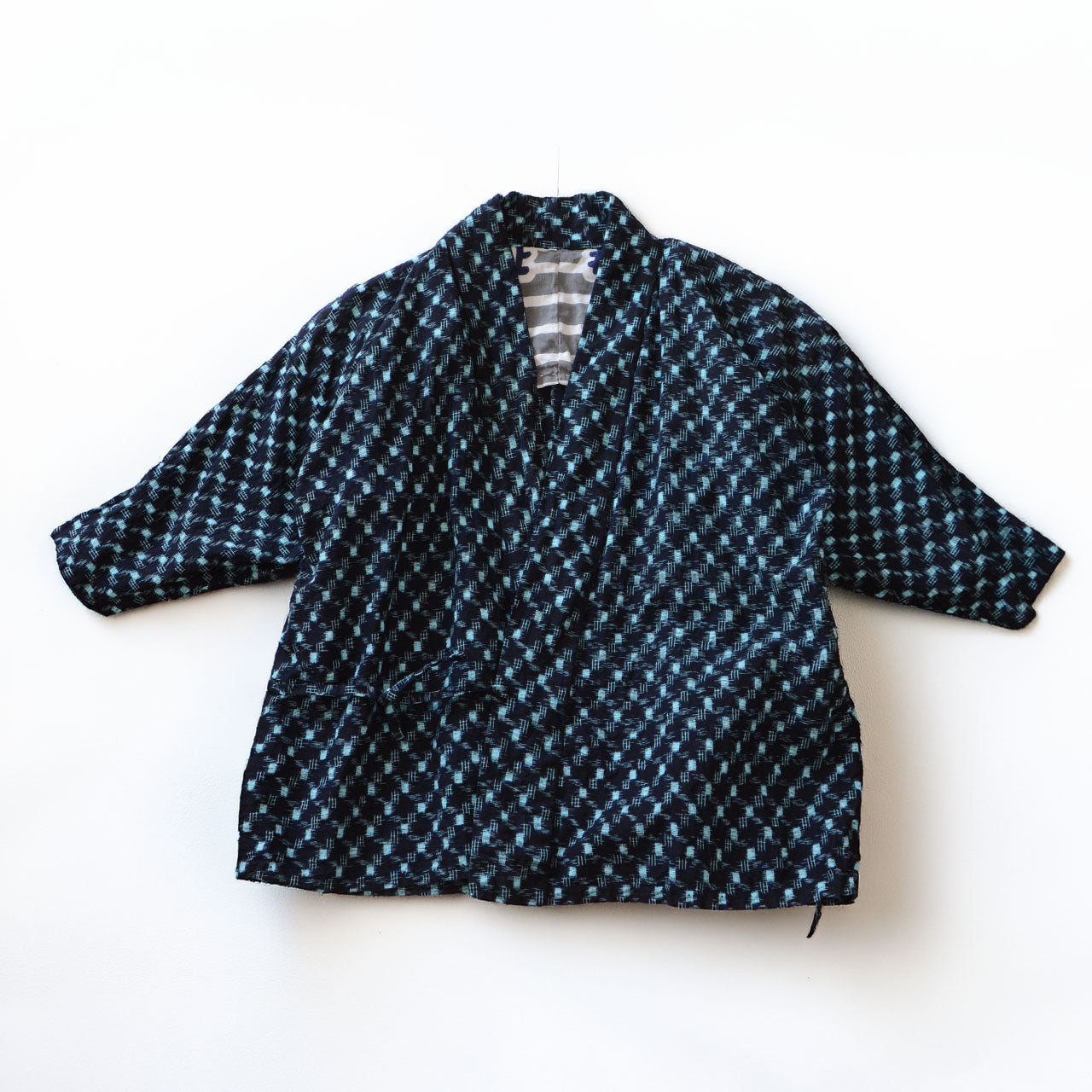 Indigo kasuri noragi jacket, hand-stitched, tenugui-lined, Japanese vintage clothing