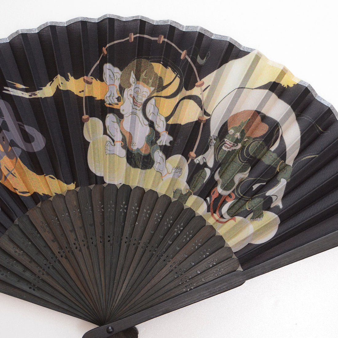 The Timeless Charm of Japanese Folding Fans with Fujin Raijin Design