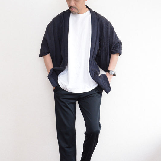 171 cm male model wearing a deep navy Japanese vintage haori kimono jacket over a white T-shirt and black trousers