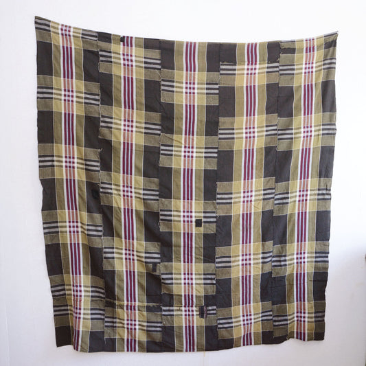 Vintage Japanese boro futon-gawa fabric, plaid cotton in black, khaki, burgundy and white, hung flat showing full surface and vertical panel seams, Showa era