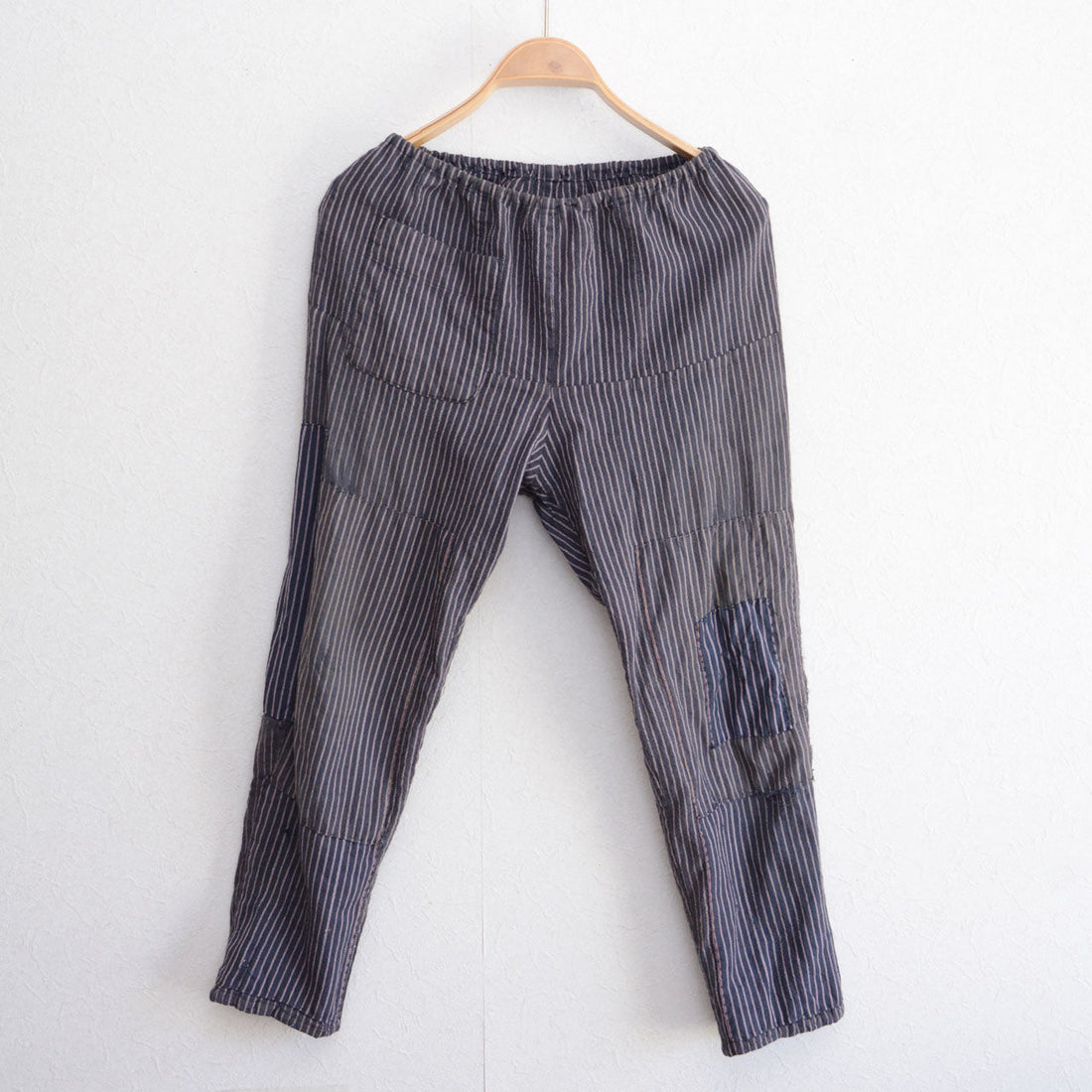 Japanese vintage monpe pants with striped fabric and patchwork repair