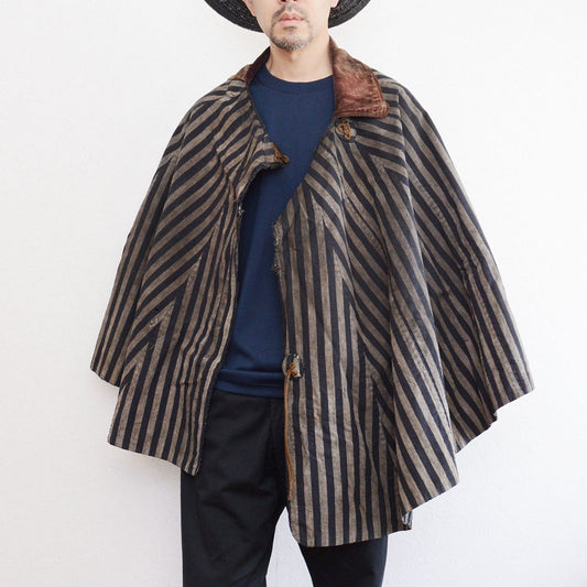 Japanese dochu-kappa travel cape, vertical stripe cotton, brown collar, full-circle silhouette, styled on model, front