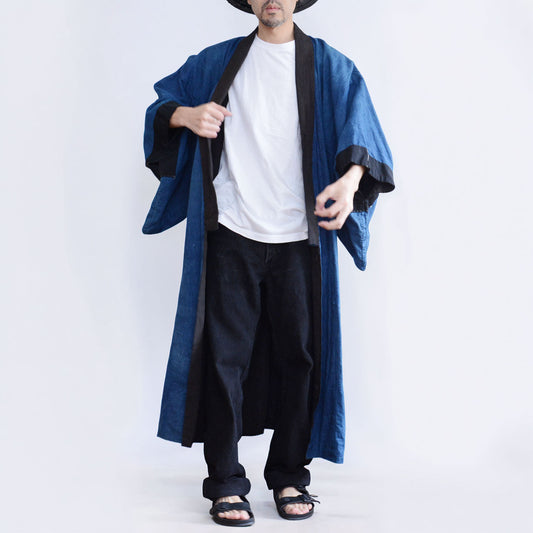 Japanese vintage men's cotton kimono with plain indigo lining, dark collar and cuffs, white T-shirt and black trousers
