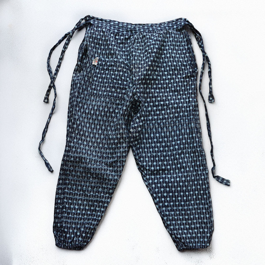 Indigo Bingo kasuri monpe pants, front view, tie waist, Showa-era Japan vintage workwear by YAMAKI