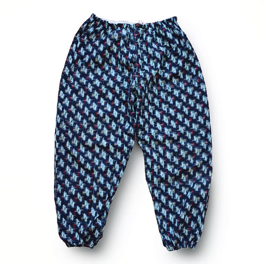 Indigo kasuri cotton monpe pants, front view, navy and white ikat pattern, elastic waist, Mid-Showa era Japanese vintage workwear