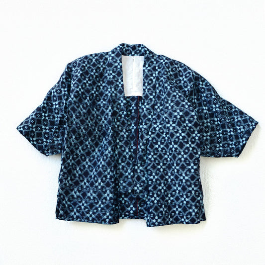Indigo-dyed cotton noragi from mid-Showa era Japan with igeta kasuri ikat pattern