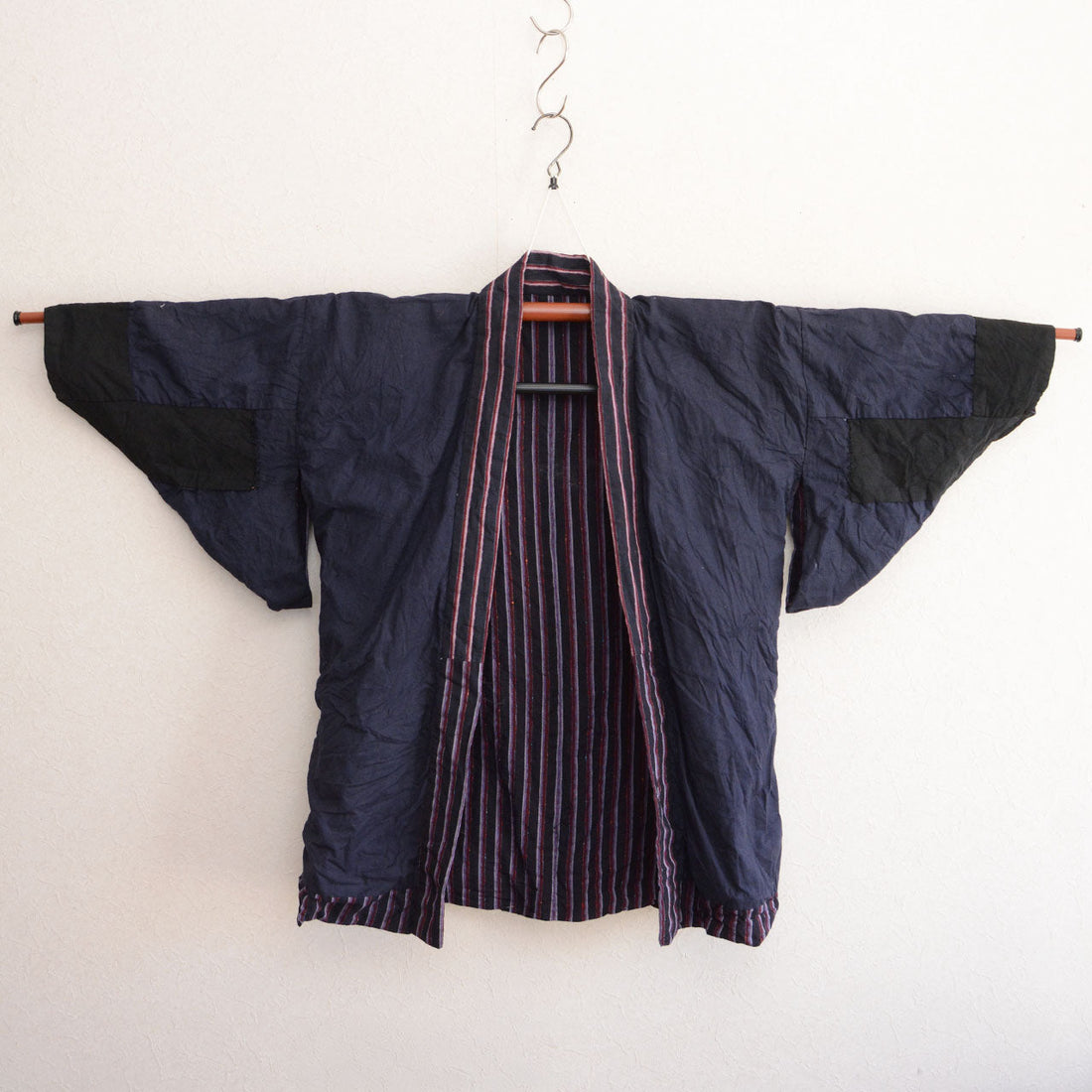 The 12cm Cuff: Why a Handsewn Showa Noragi Narrows to Almost Nothing at the Wrist