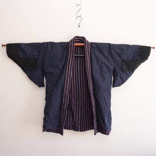 The 12cm Cuff: Why a Handsewn Showa Noragi Narrows to Almost Nothing at the Wrist